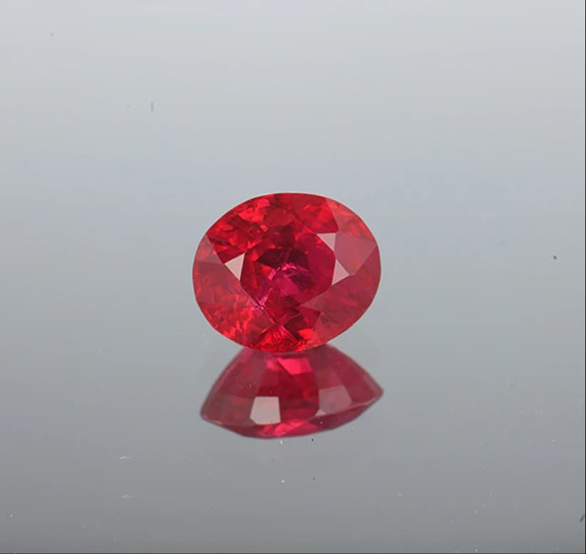 Faceted ruby on dark background