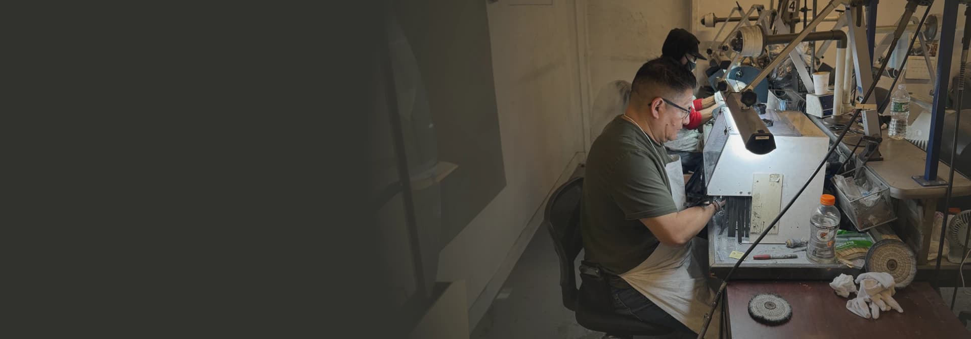 Master jeweller at the polishing wheel