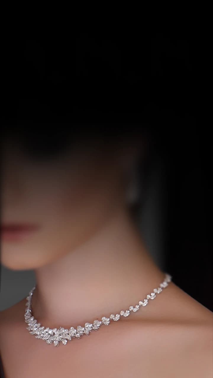 Model wearing a diamond necklace